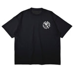 Heavyweight cotton tee in black featuring the APT.4B Globe logo. Represents the brand's journey from local Queens roots to global influence.