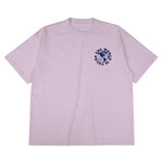 Heavyweight cotton tee in pale grape purple featuring the APT.4B Globe logo. Represents the brand's journey from local Queens roots to global influence.