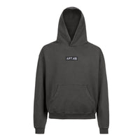 Black hoodie featuring the classic APT.4B Dynamo box logo. Essential heritage streetwear with a clean, architectural design.